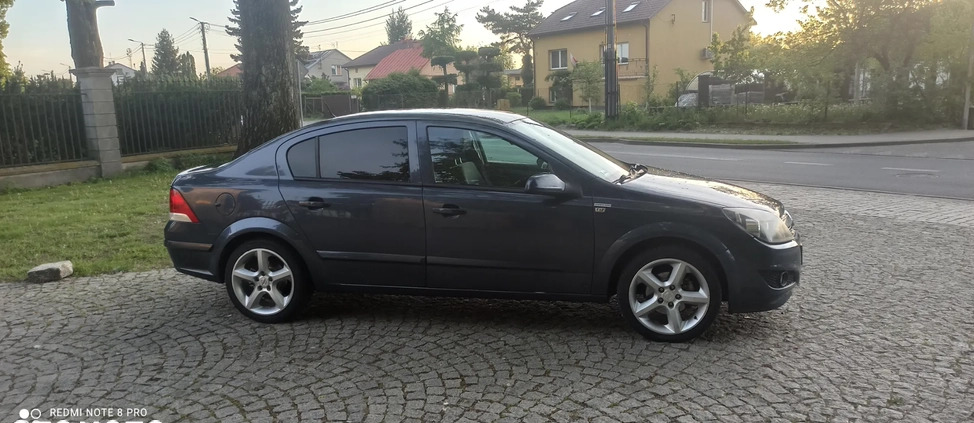 Opel Astra cena 14499 przebieg: 227000, rok produkcji 2008 z Krzyż Wielkopolski małe 106